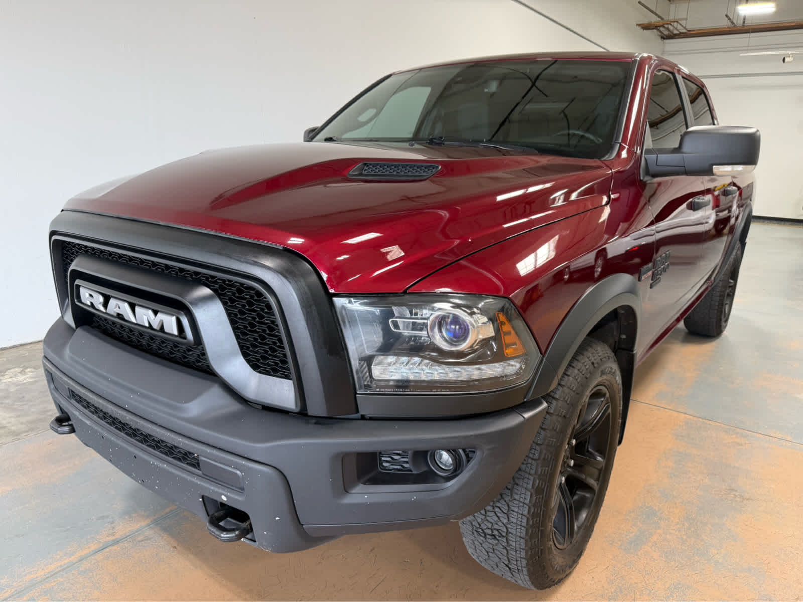 2022 RAM 1500 Classic SLT in Red/Red — front three-quarter view