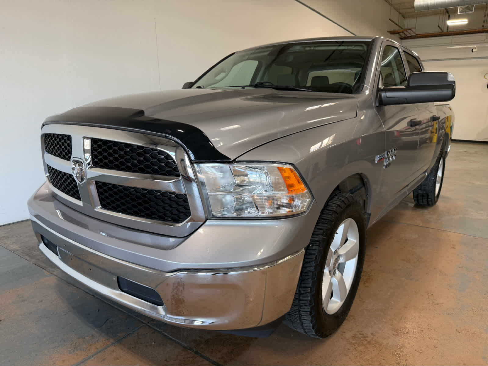 2023 RAM 1500 Classic SLT in Sil/Silver — front three-quarter view