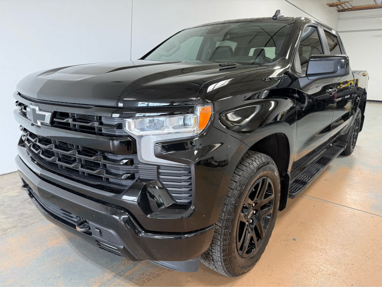 2023 Chevrolet Silverado 1500 RST in Black — front three-quarter view